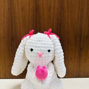 Cut and soft handknitted rabbit toy