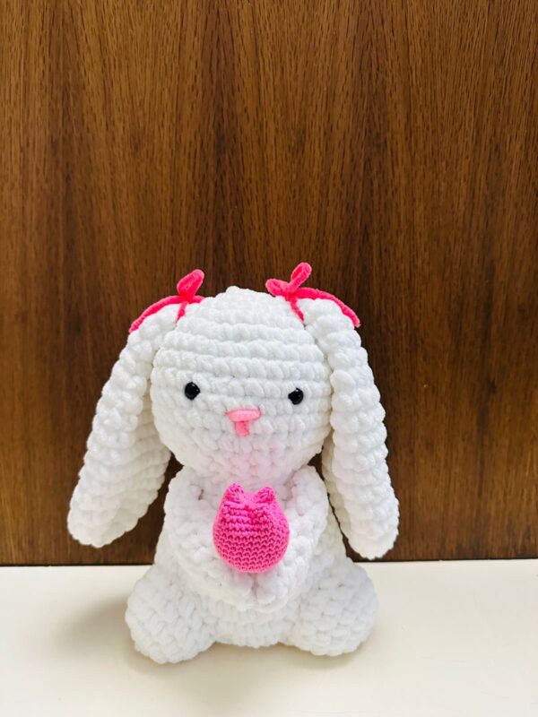 Cut and soft handknitted rabbit toy